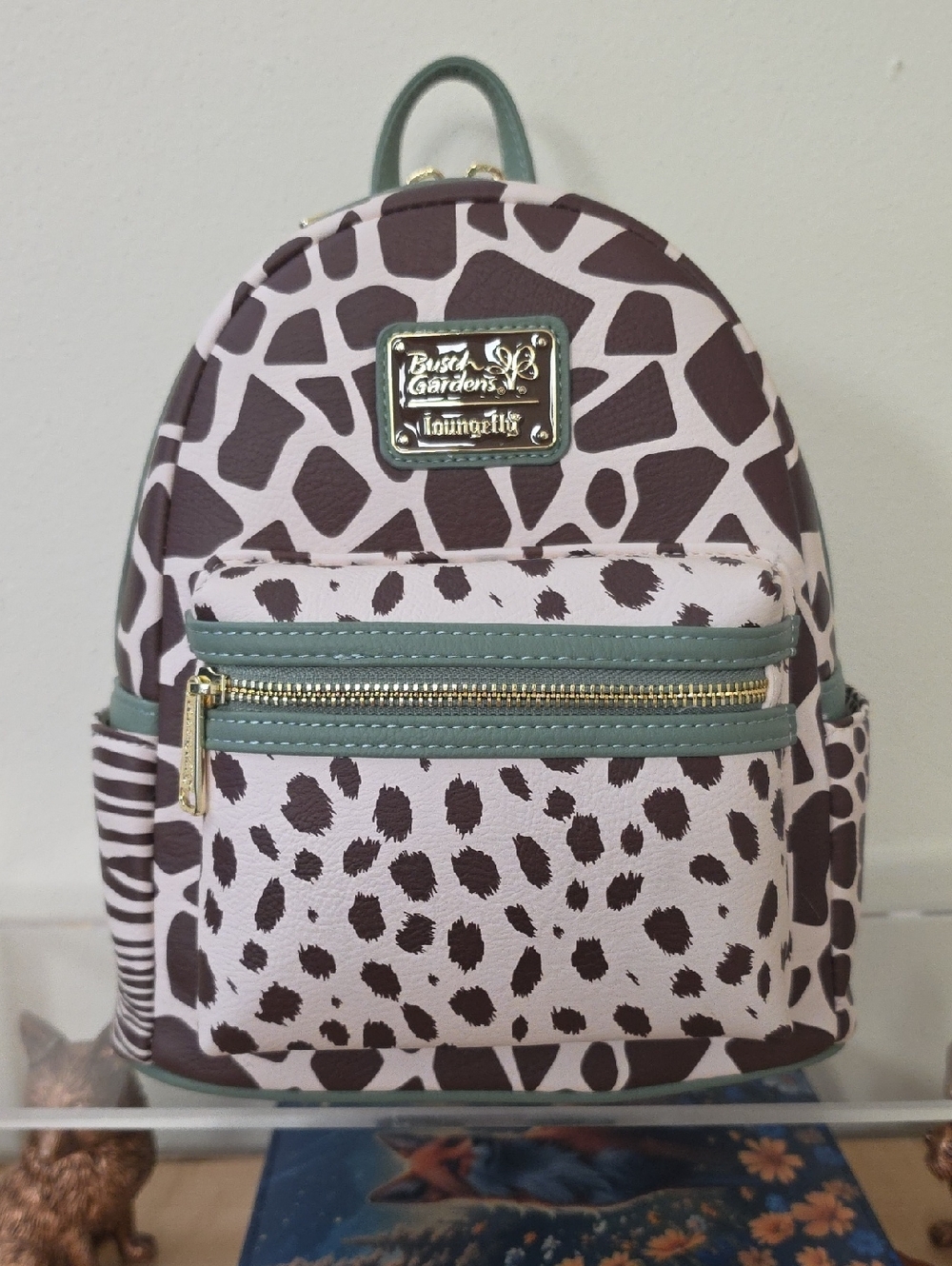 Loungefly Busch Gardens Exclusive Safari Spot Mini Backpack with Green Trim